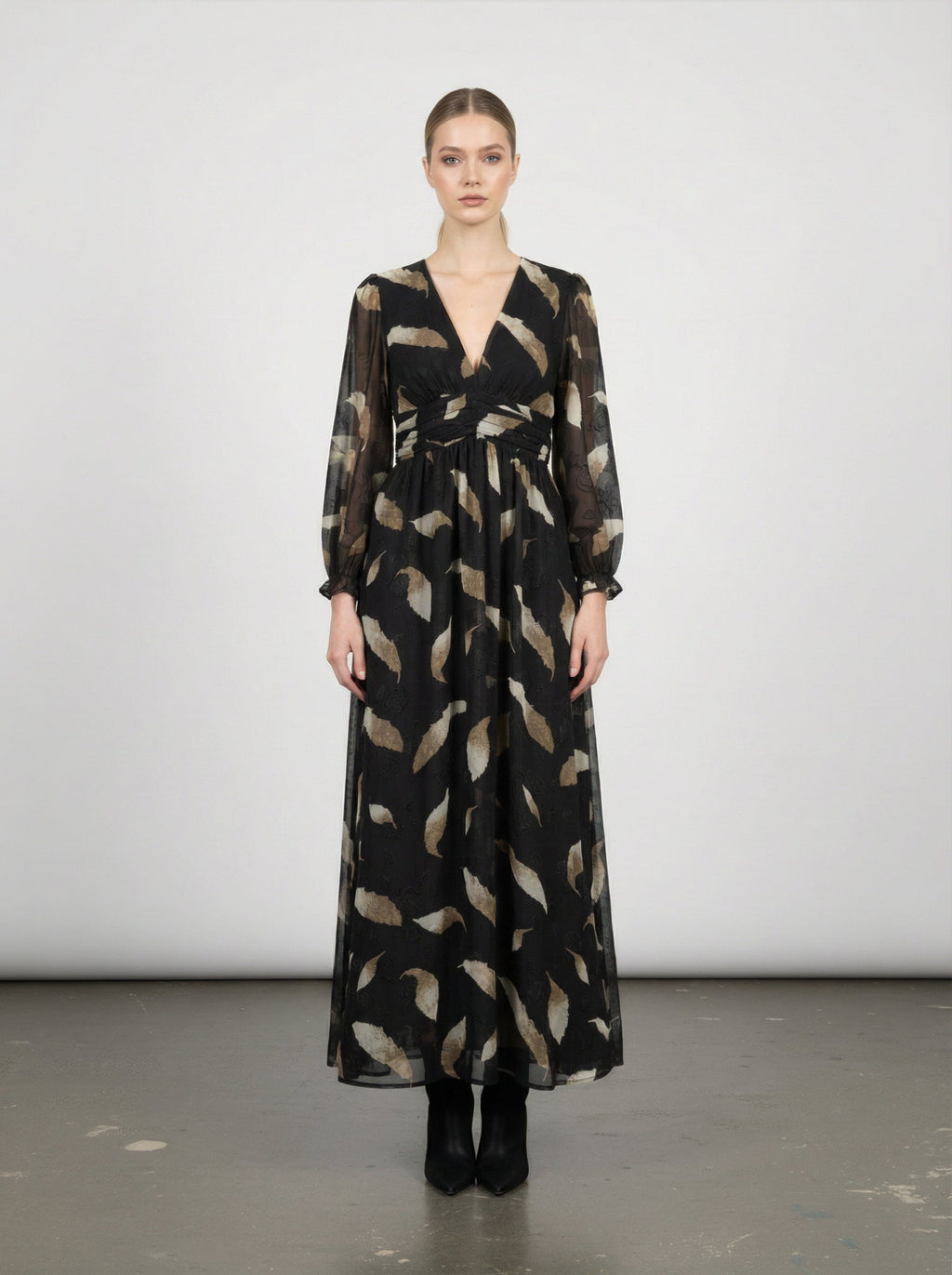 Abito lungo con maniche a sbuffo