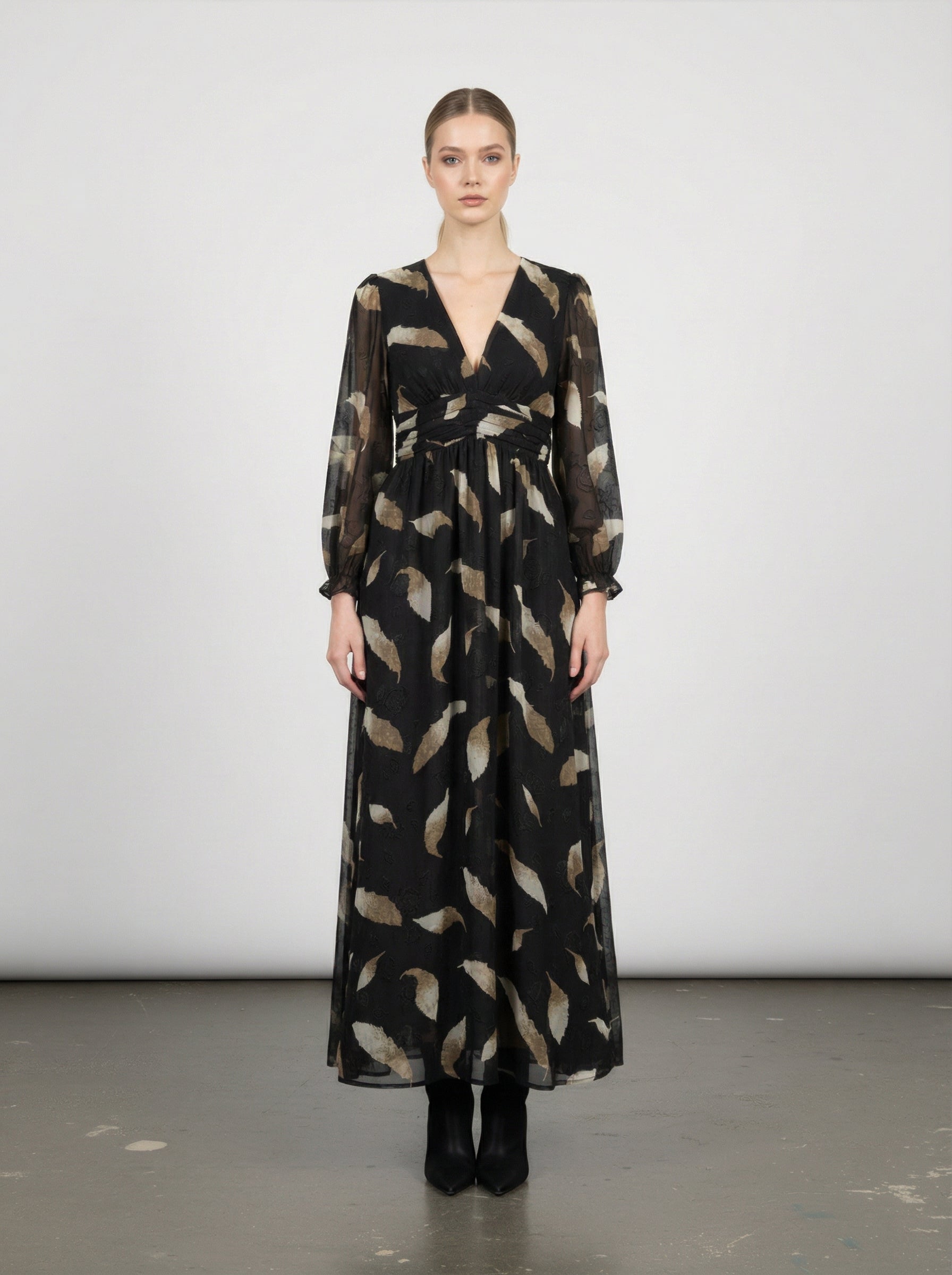 Abito lungo con maniche a sbuffo