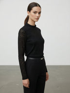 Blusa in pizzo elegante