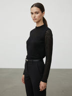 Blusa in pizzo elegante