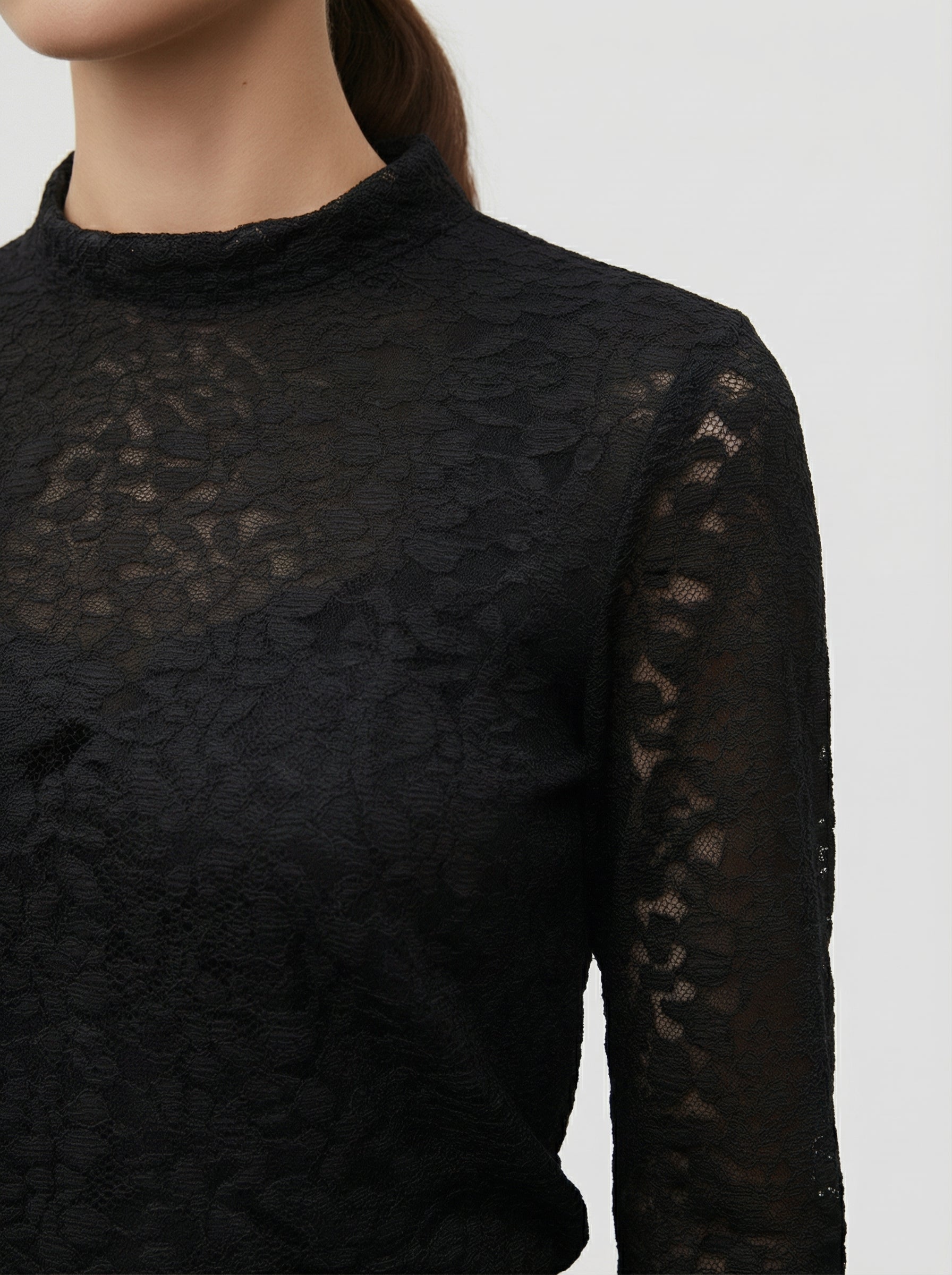 Blusa in pizzo elegante