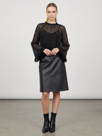 Blusa trasparente con perline