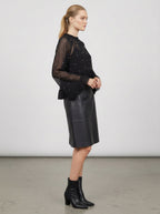 Blusa trasparente con perline