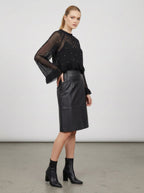 Blusa trasparente con perline