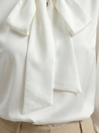 Camicia satinata con fiocco