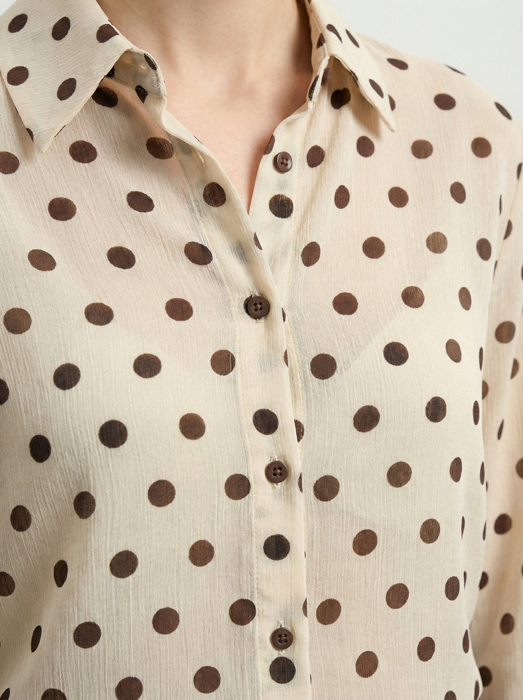 Camicia a pois semitrasparente