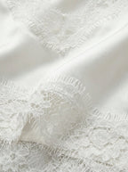 Canottiera satinata con pizzo