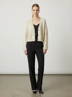 Cardigan chic con bottoni