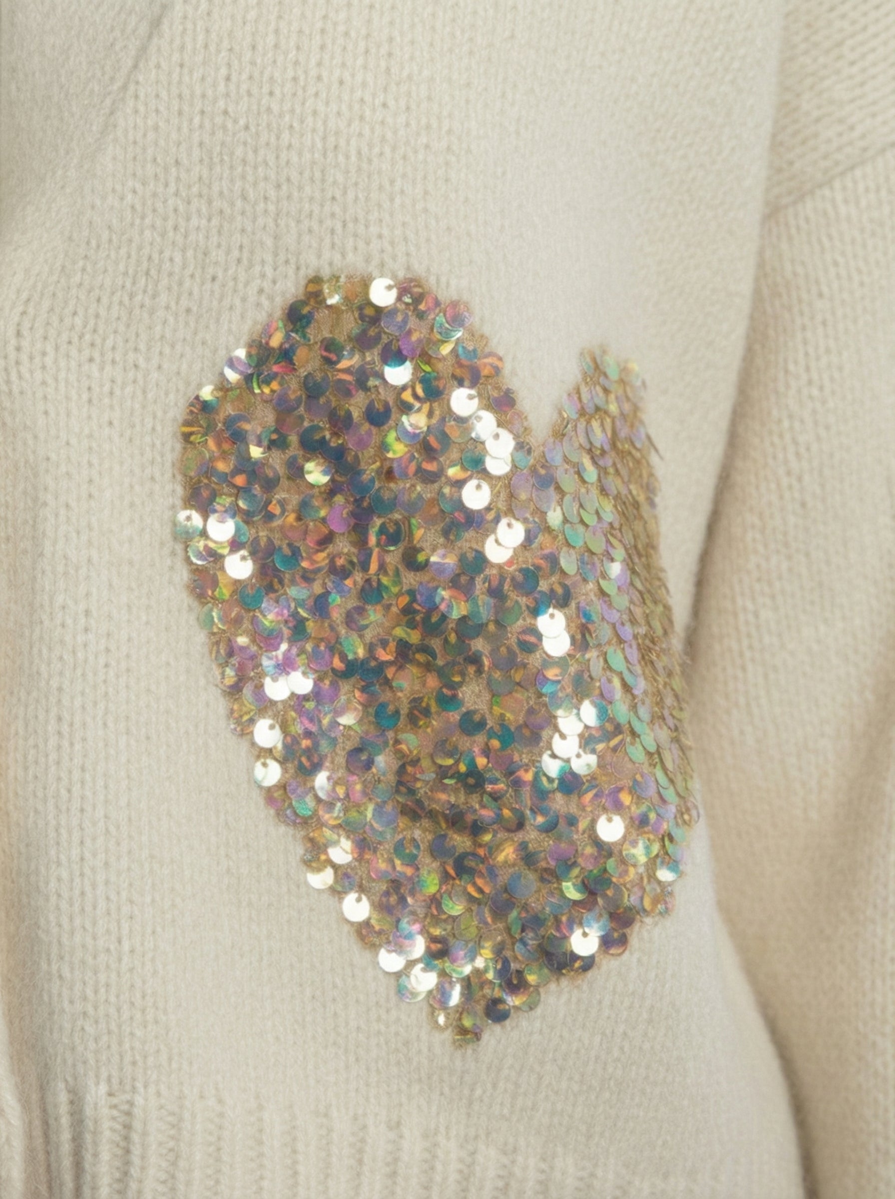 Cardigan con cuori in pailletes