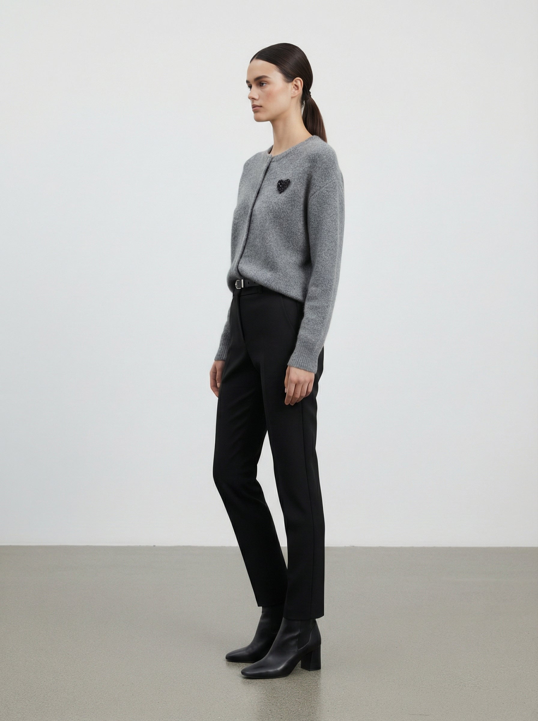 Cardigan con cuore in paillettes