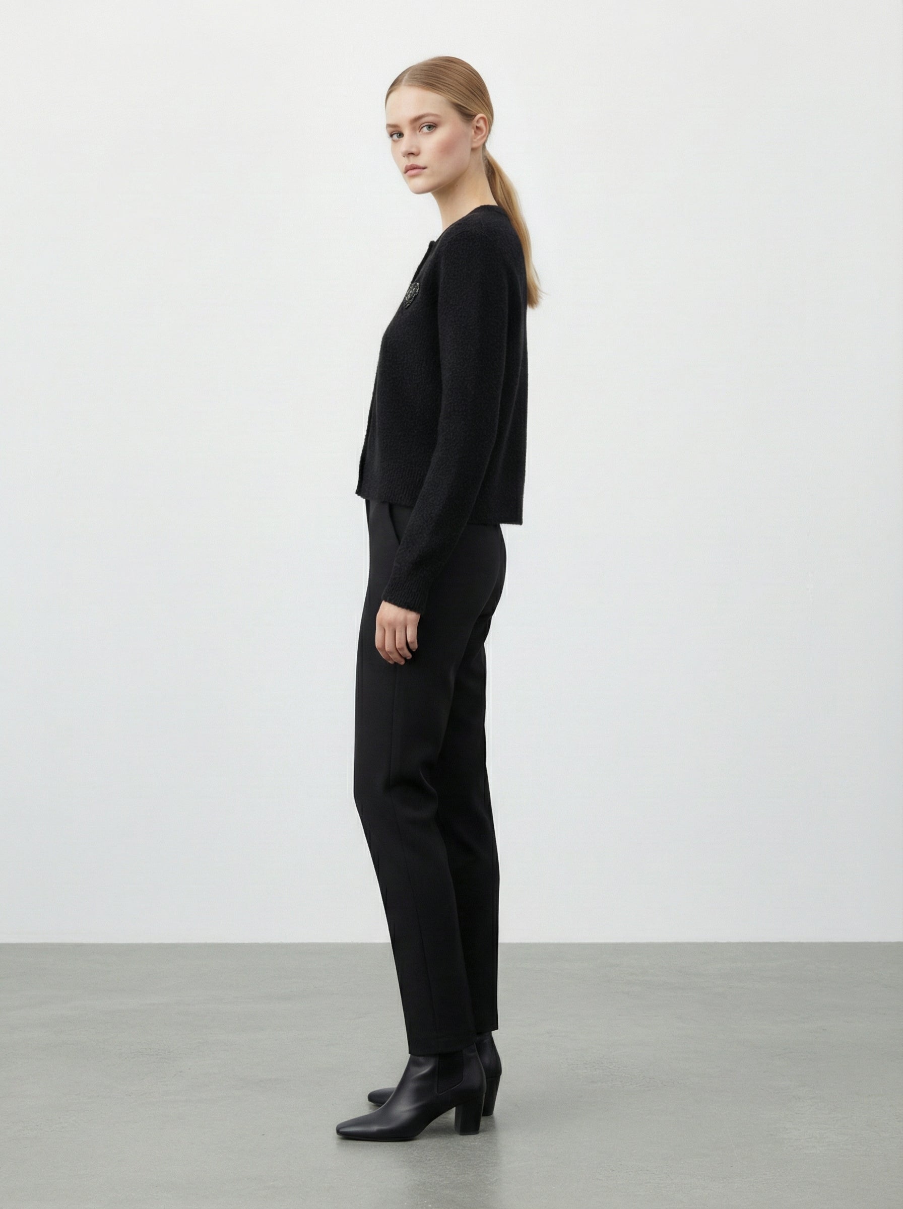 Cardigan con cuore in paillettes