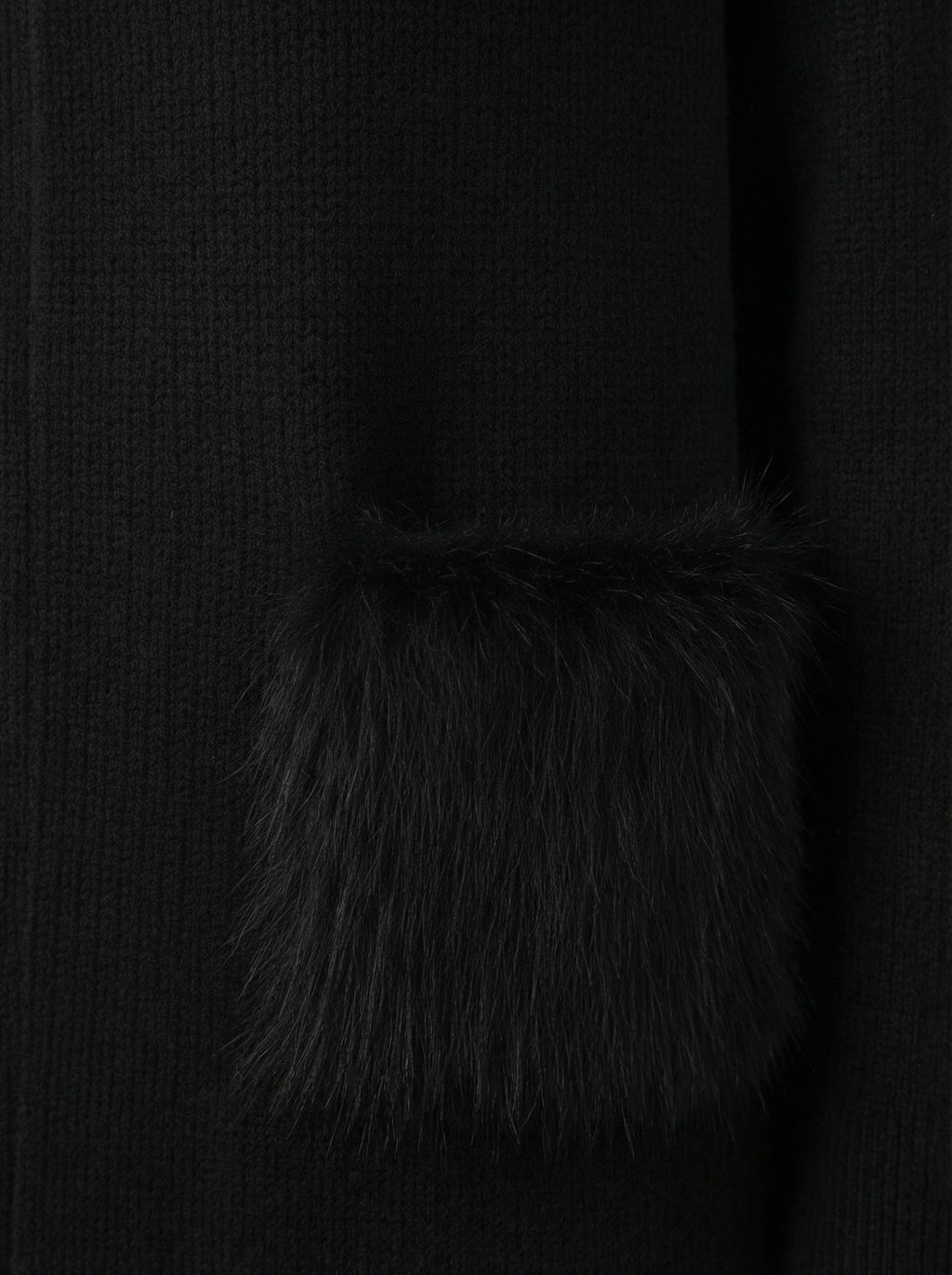 Cardigan smanicato con tasche in pelliccia