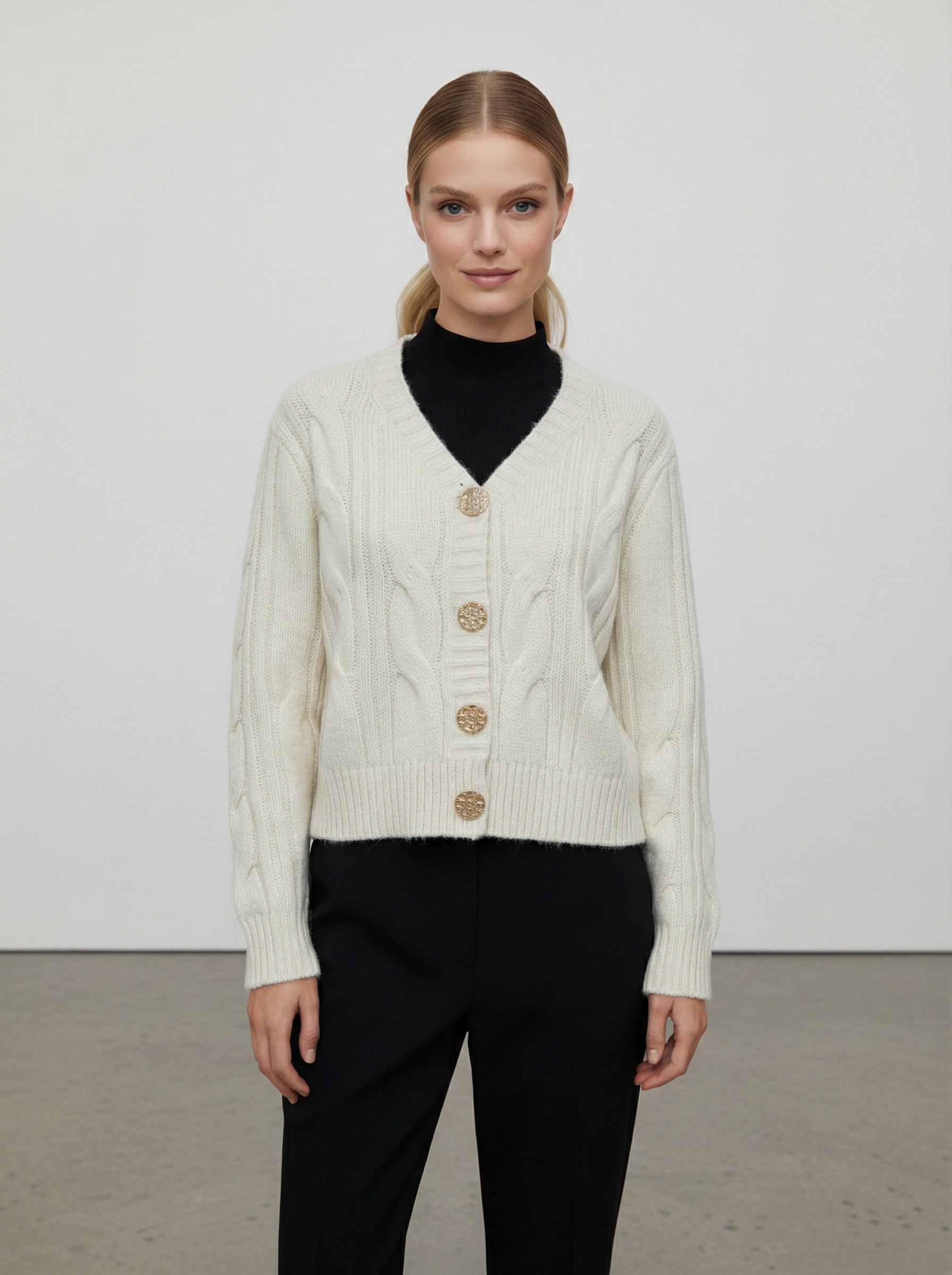 Cardigan lavorato a trecce