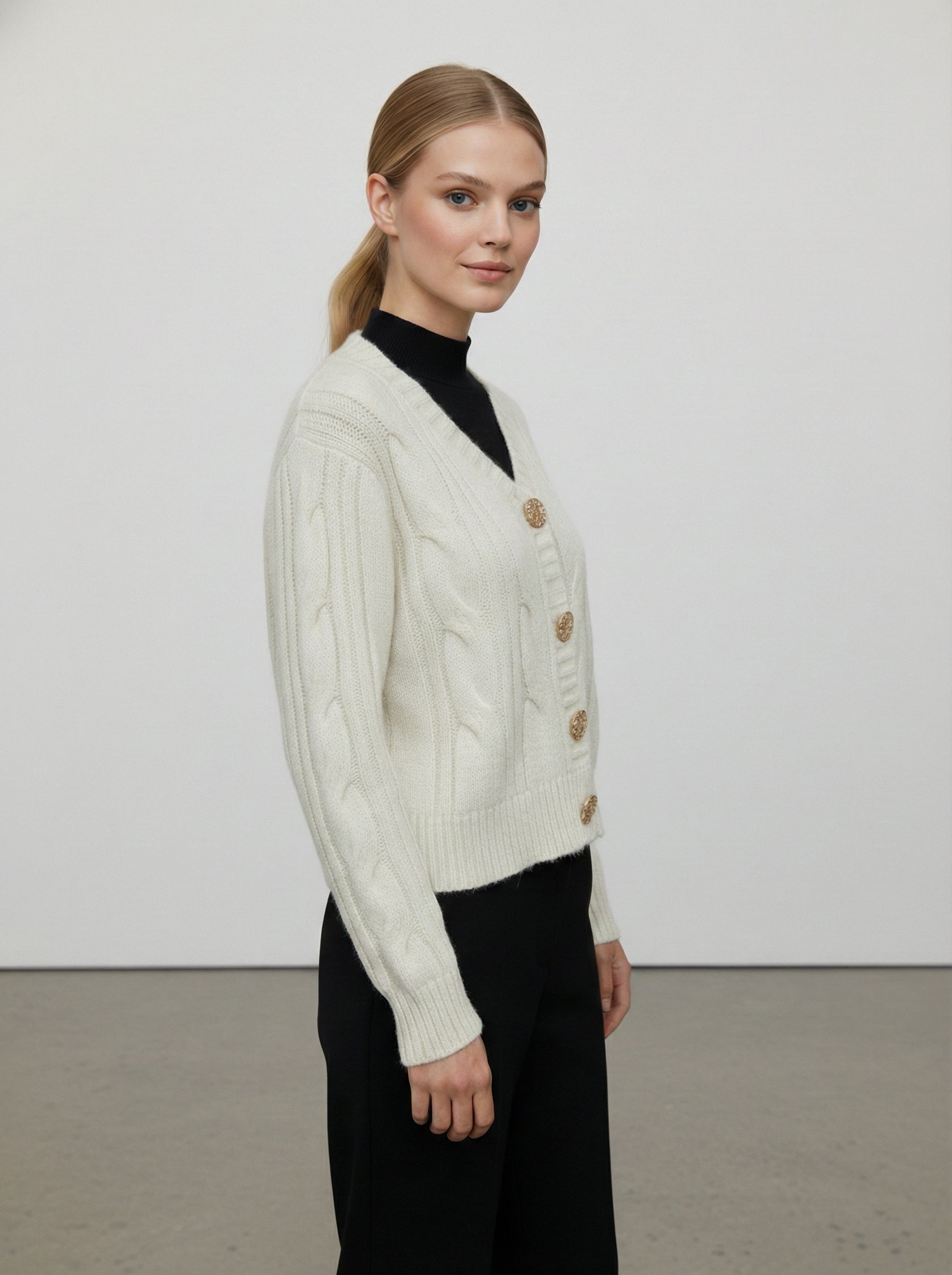 Cardigan lavorato a trecce