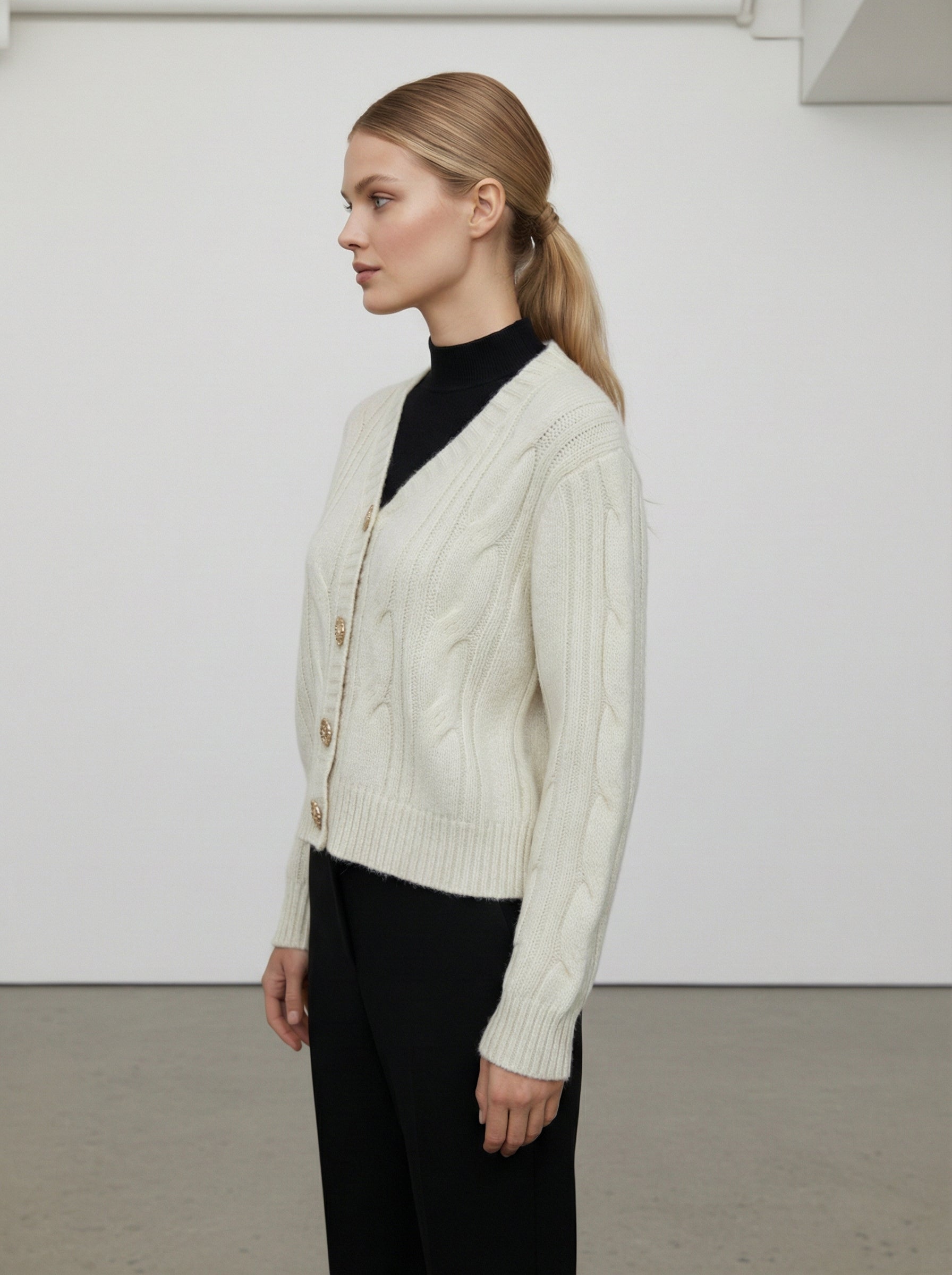 Cardigan lavorato a trecce