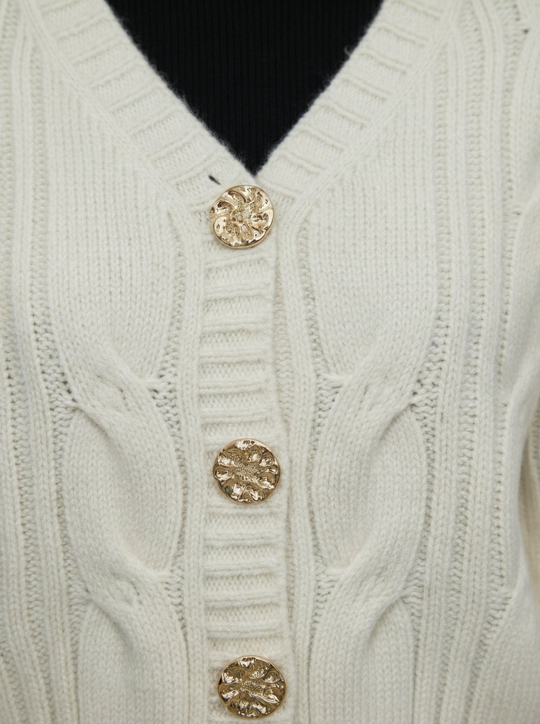 Cardigan lavorato a trecce