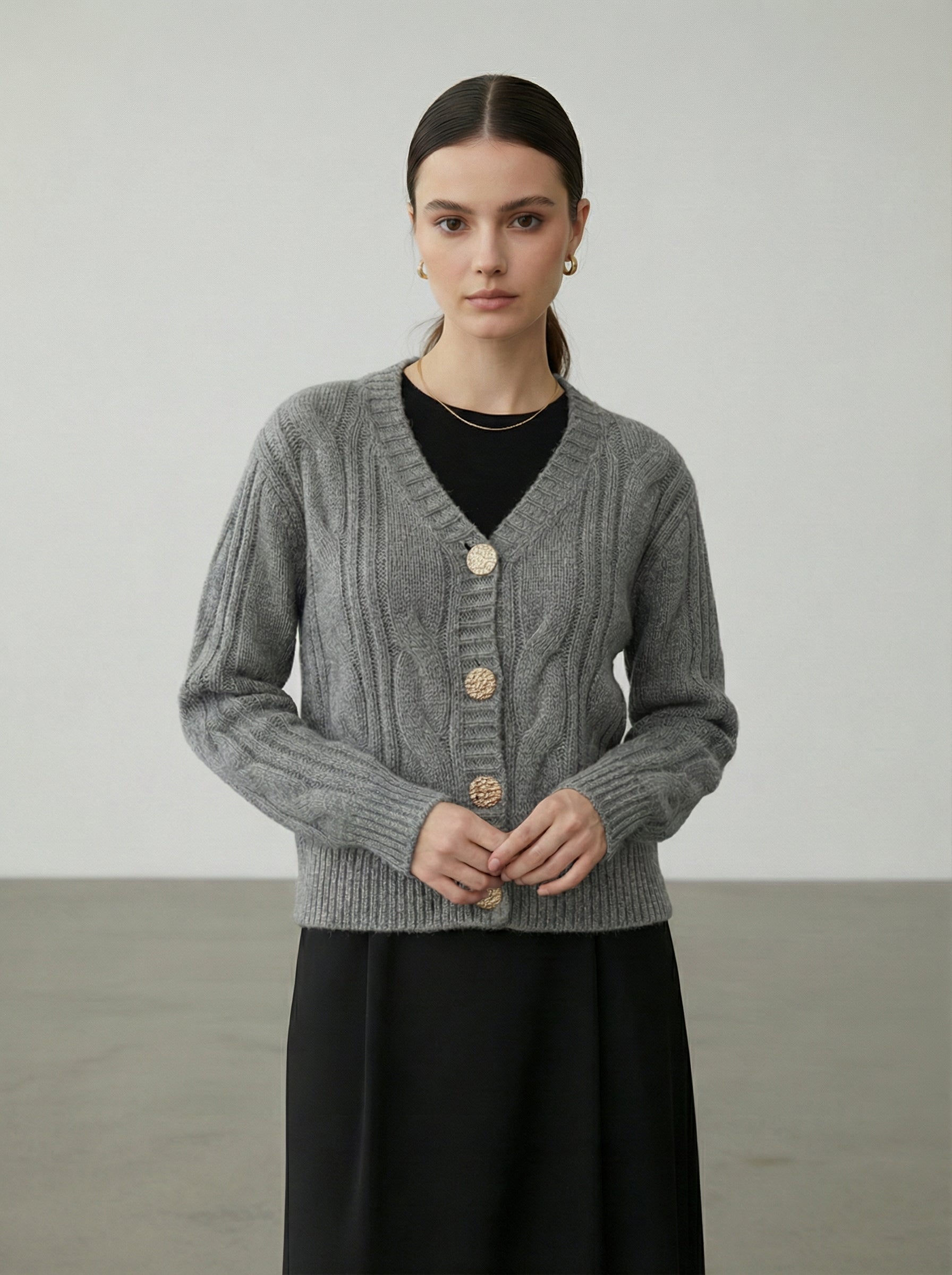 Cardigan lavorato a trecce