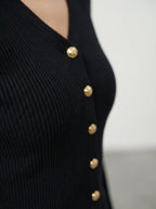 Maglia con bottoni chic