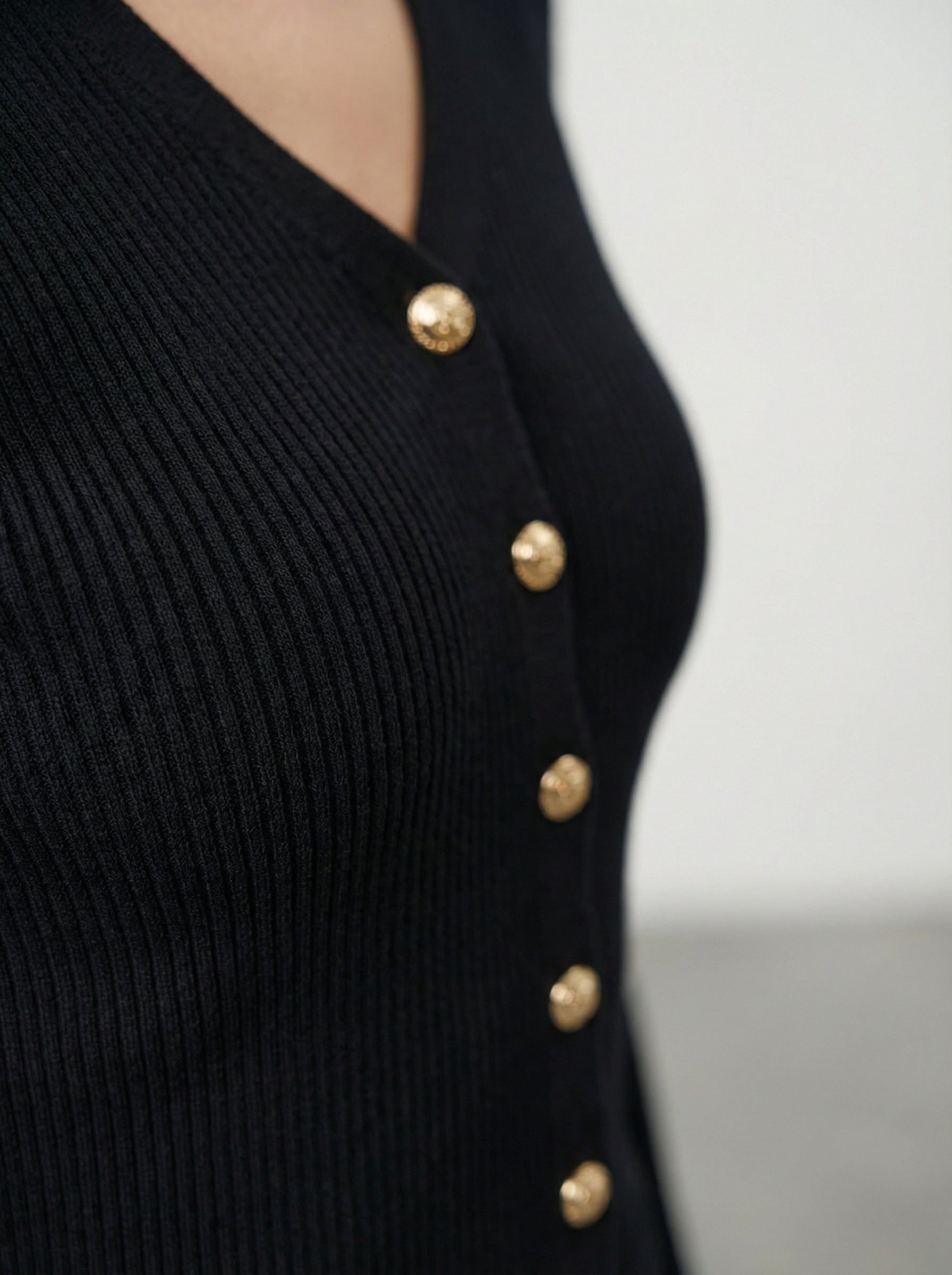 Maglia con bottoni chic