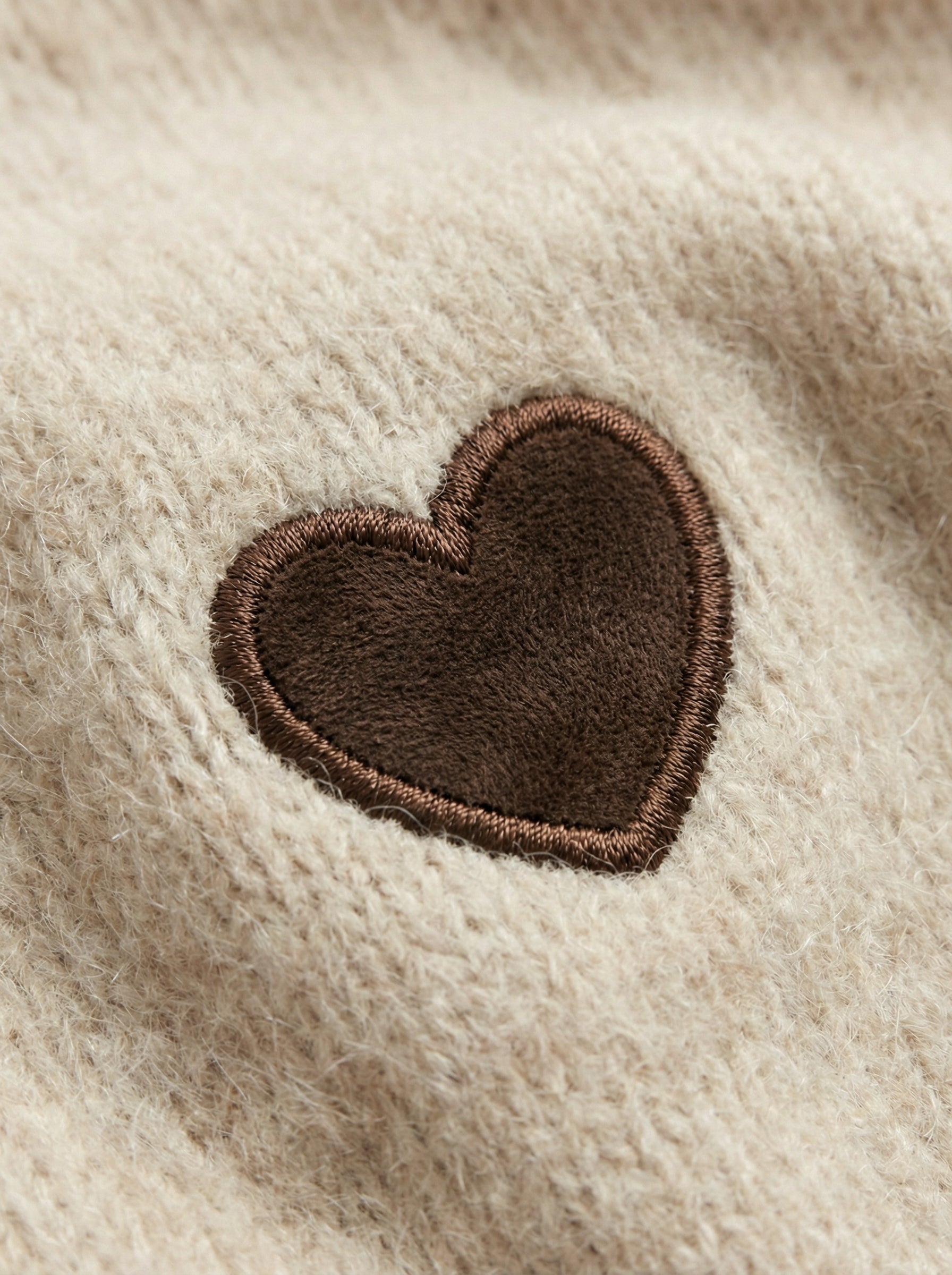 Maglia a collo alto con cuori